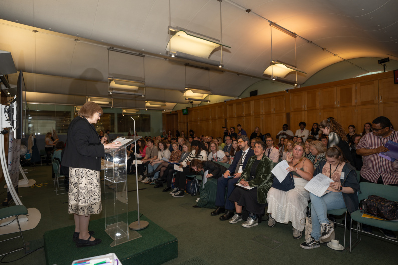 Participants at the APPGC event sitting in Attlee Suite as Baroness Tyler speaks