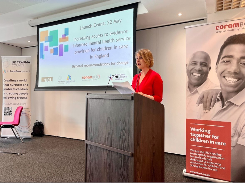 Image of Helen Hayes MP standing at a lectern giving the keynote speech at the event