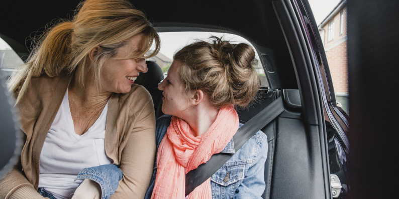 Mother and daughter in a car